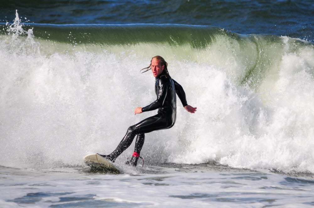 Wellenreiter am Weststrand